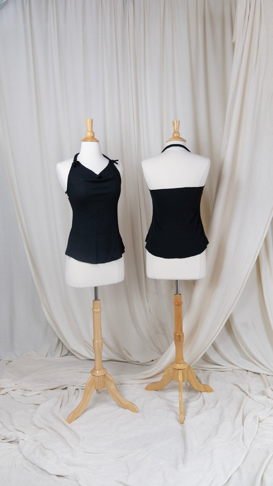 two black halter tops with braided straps and cowl neck