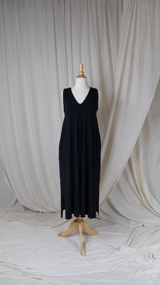 one mid lengthdress with a vneck and large armholes