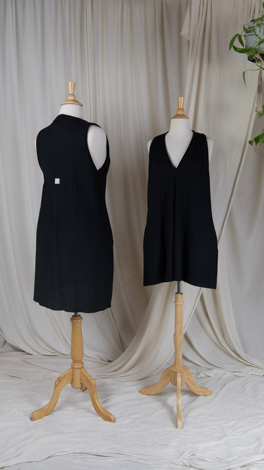 two black sundresses with no sleeves and v-neck